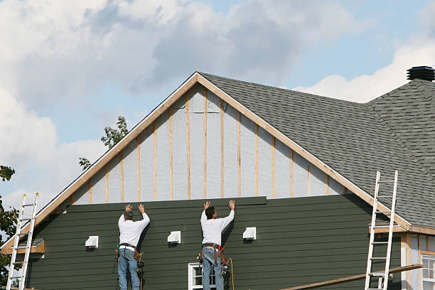 Professional Siding technician working in Rillton, PA